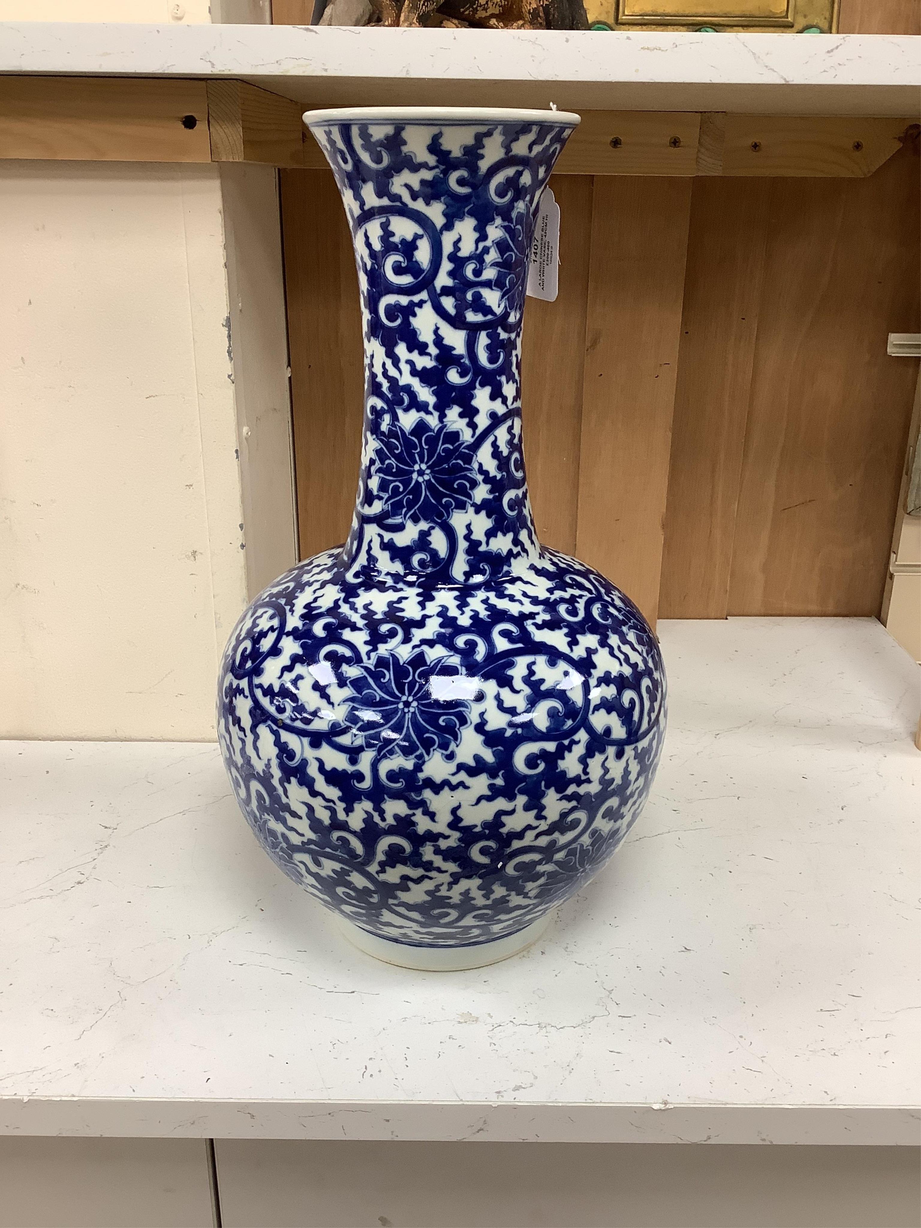 A large Chinese blue and white vase, 42cm high. Condition - good